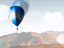 Balloon with a passenger gondola soaring over the mountains represents the animation "Quest"